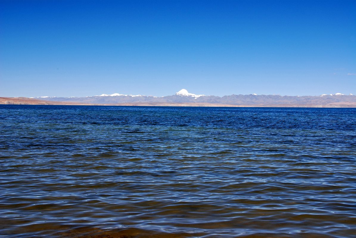 21 Lake Manasarovar And Mount Kailash From Trugo Gompa Lake Manasarovar stretches from Trugo Gompa on the south shore to Mount Kailash in the distance past the north shore.